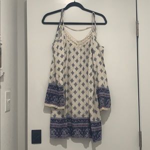 White no shoulder flow dress